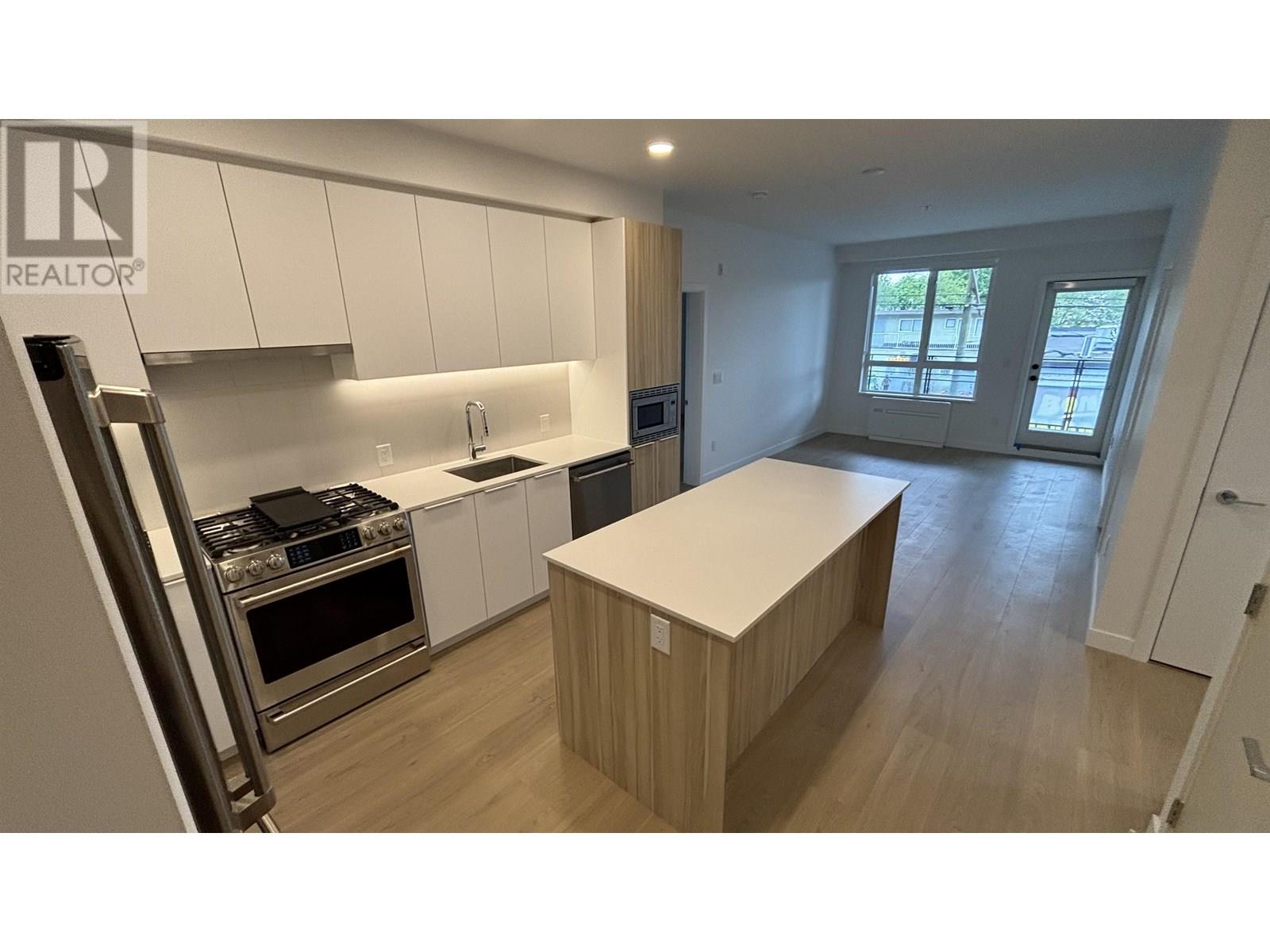213 2450 Garden Drive Property Photo 1