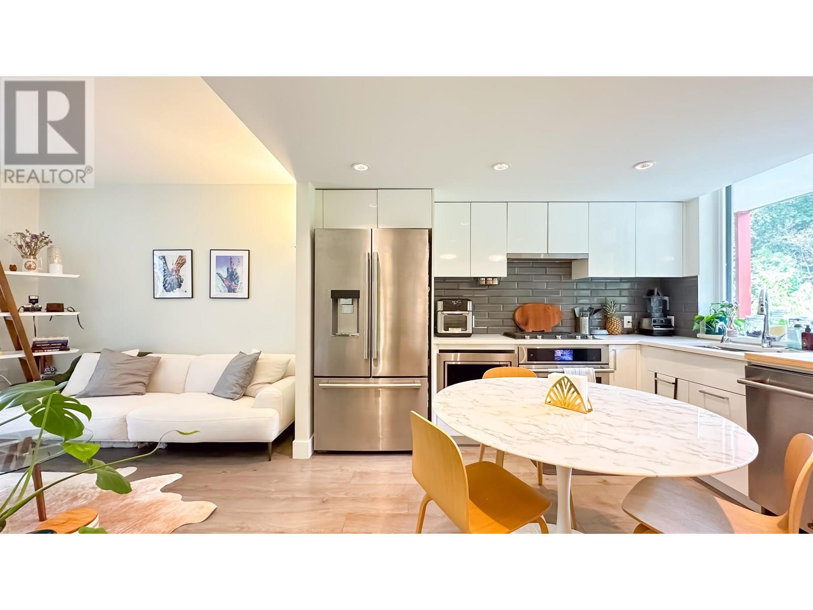 202 3498 Marine Way Property Photo 1