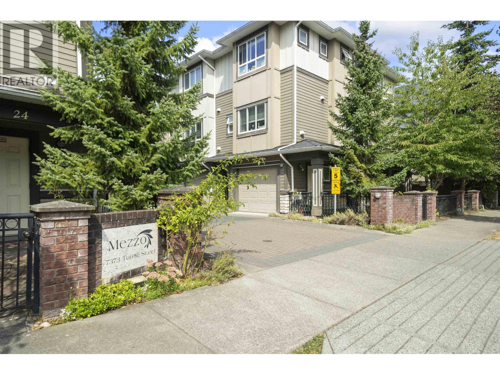 11 7373 TURNILL STREET Property Photo 1