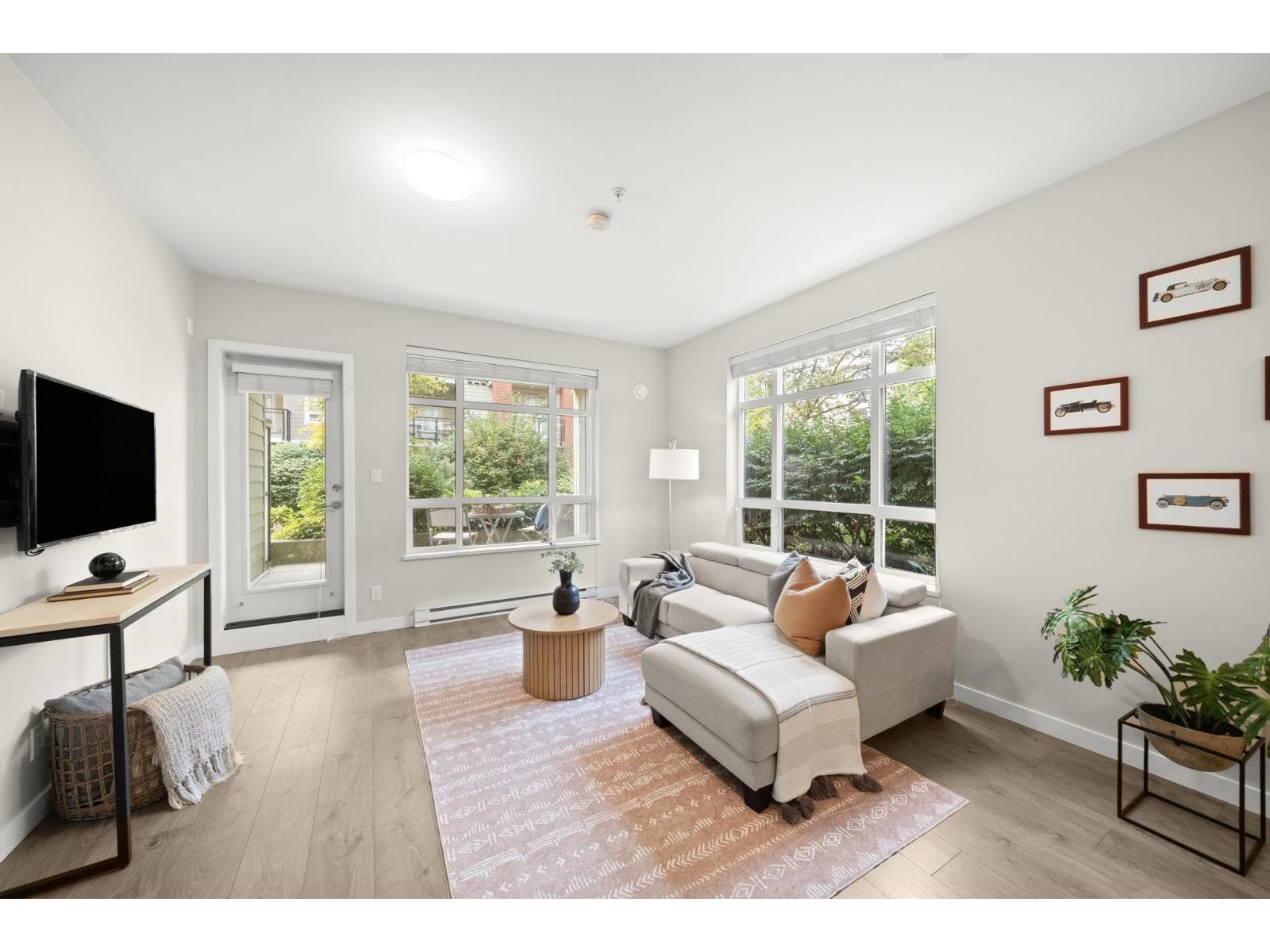 E102 20211 66 AVENUE Property Photo 1