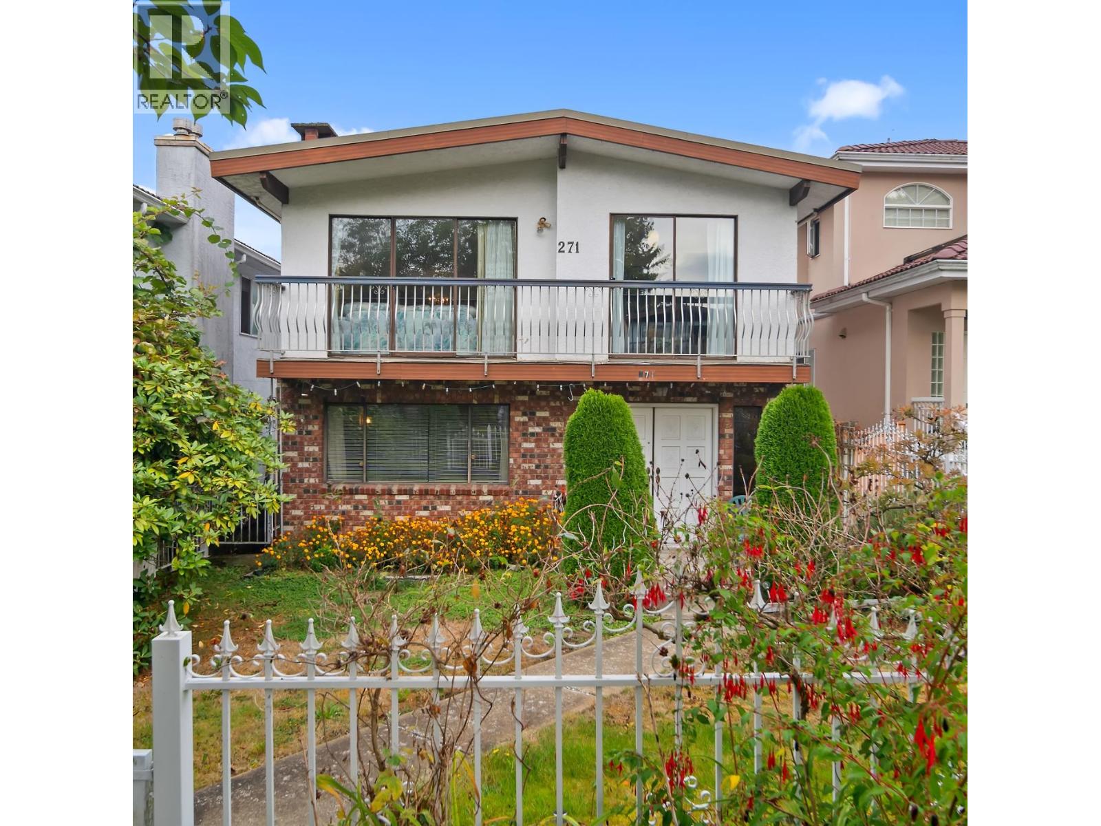 271 E 38TH AVENUE Property Photo 1