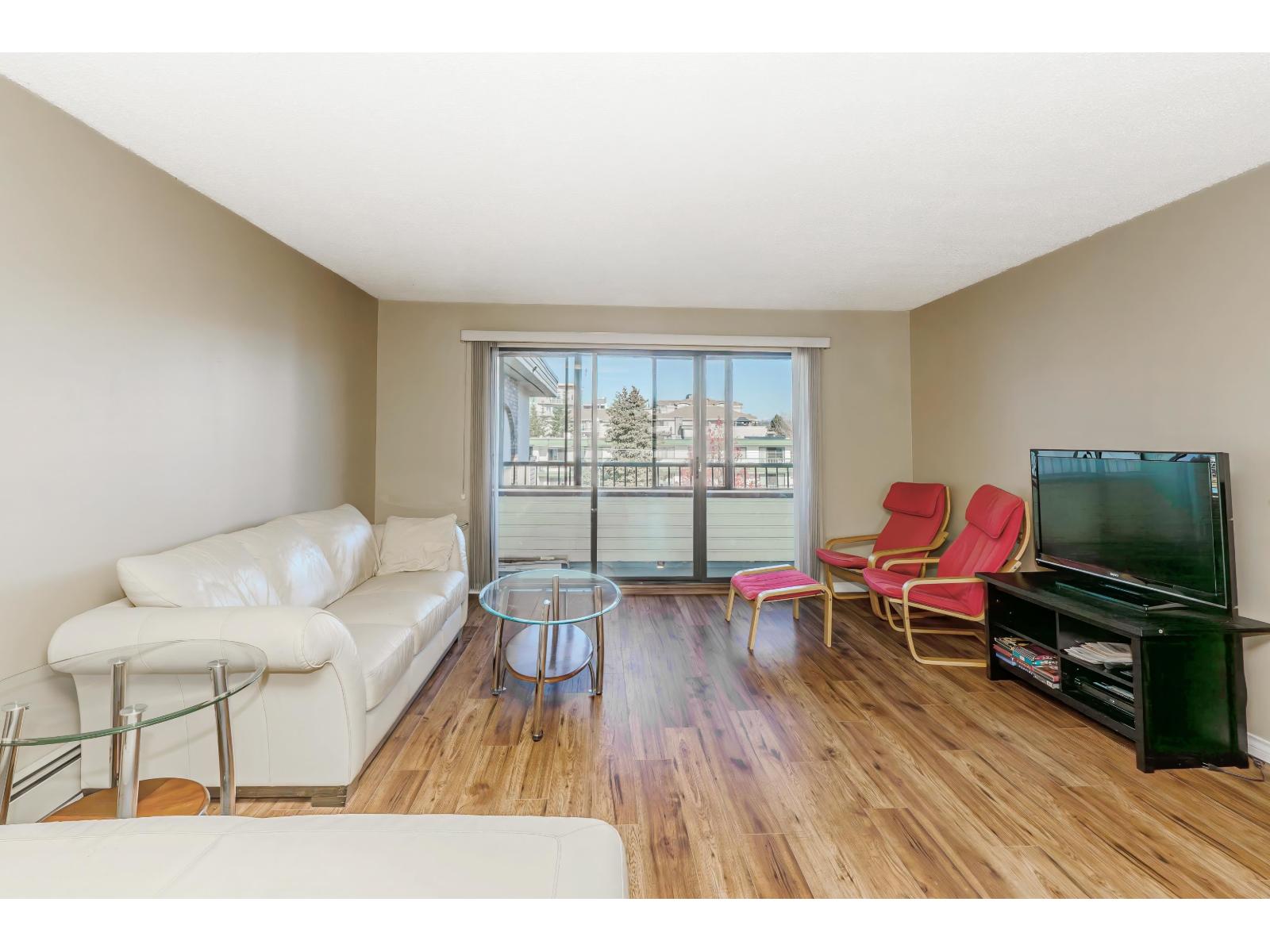 306 20460 54 AVENUE Property Photo 1