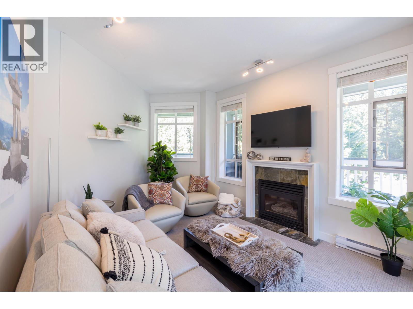 311 4405 BLACKCOMB WAY Property Photo 1