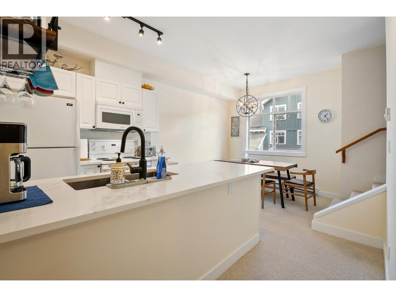 203 4405 Blackcomb Way Property Photo 8