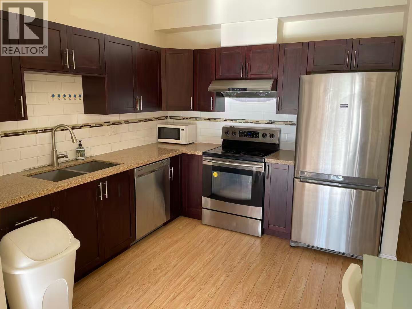202 5655 Inman Avenue Property Photo 2