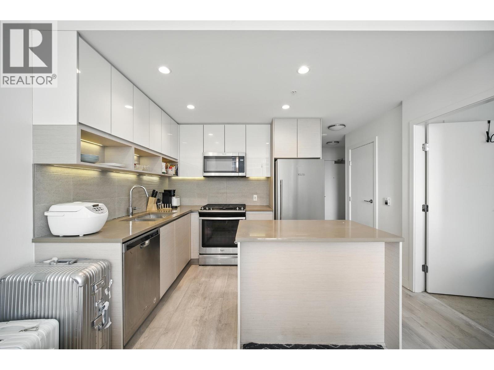 418 8850 UNIVERSITY CRESCENT Property Photo 1