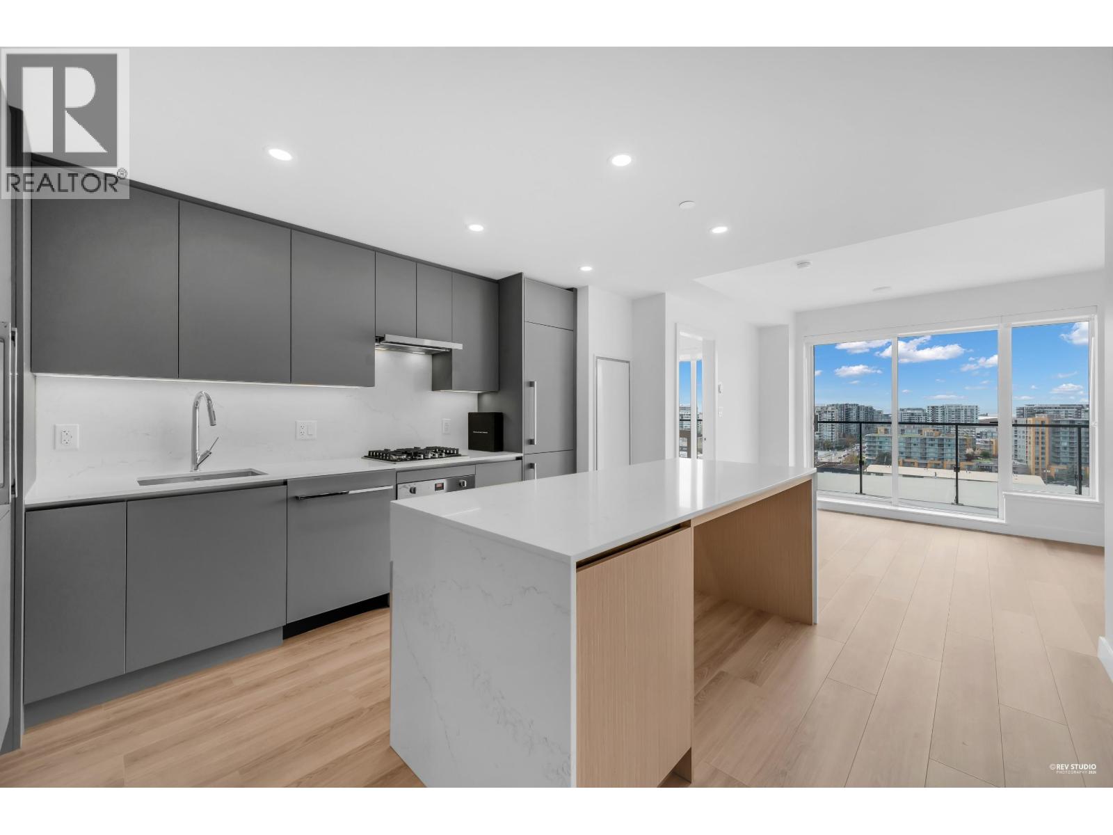 1306 5520 MCNAUGHTON ROAD Property Photo 1