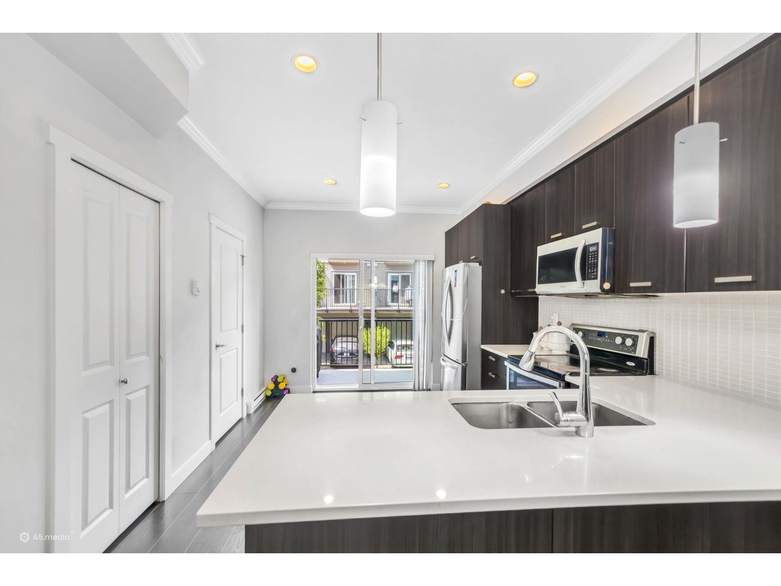115 5888 144 Street Property Photo 13