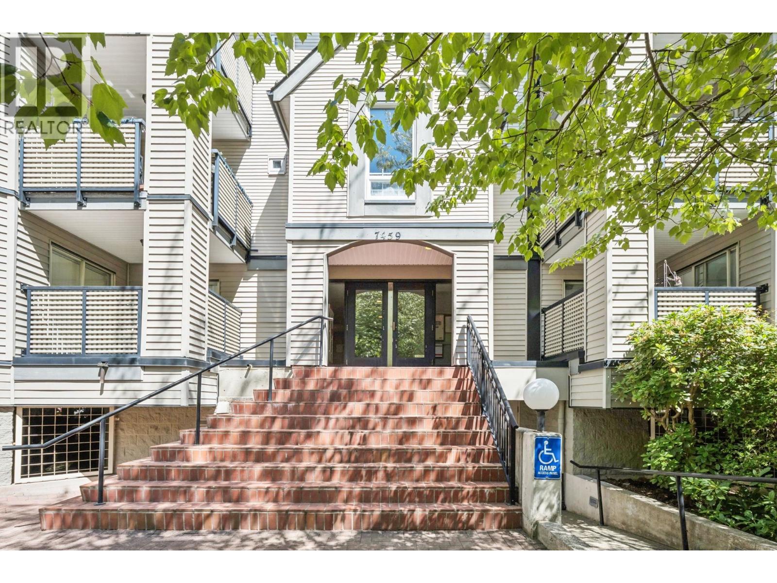 305 7459 MOFFATT ROAD Property Photo 1