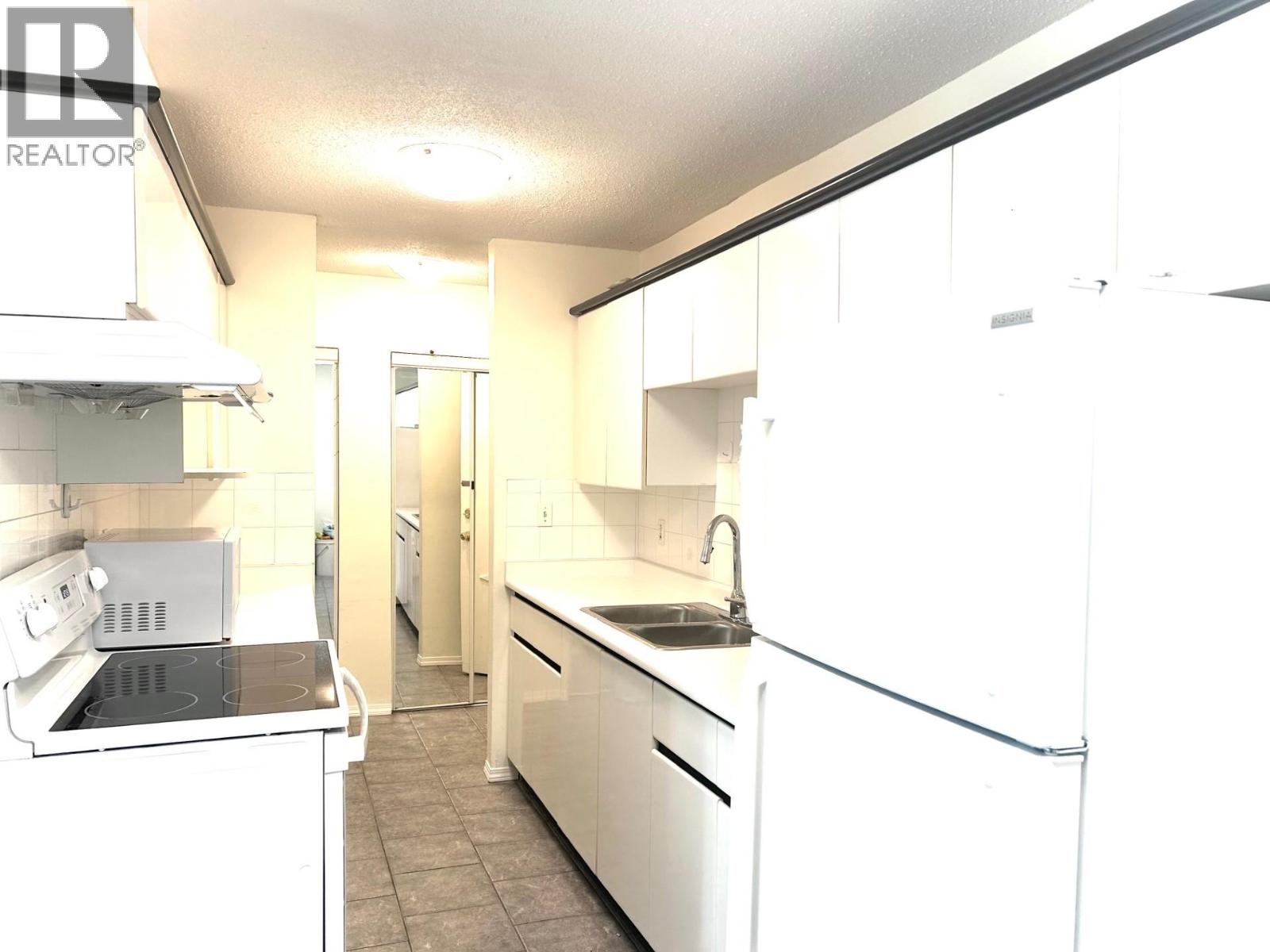 110 6420 BUSWELL STREET Property Photo 1