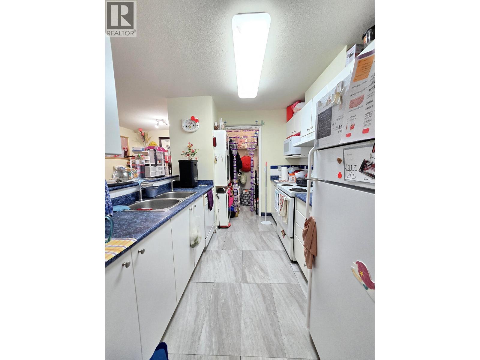 406 1145 Heffley Crescent Property Photo 10