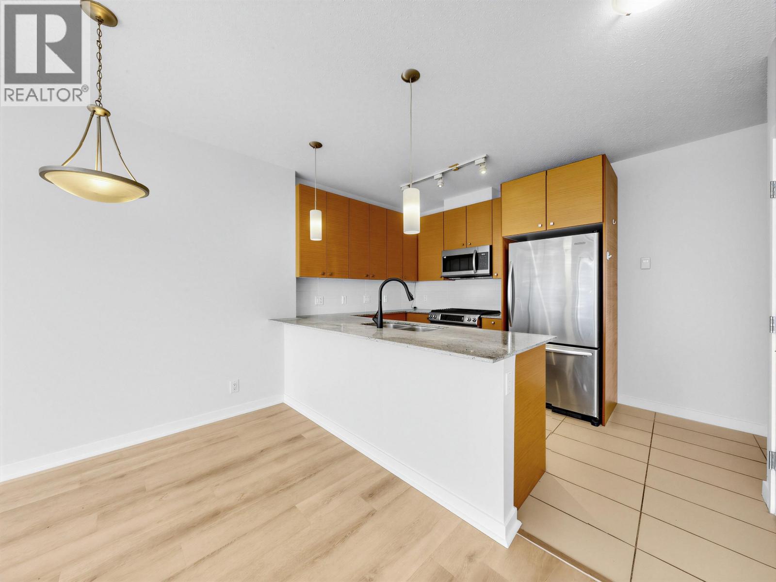 1509 7360 Elmbridge Way Property Photo 2