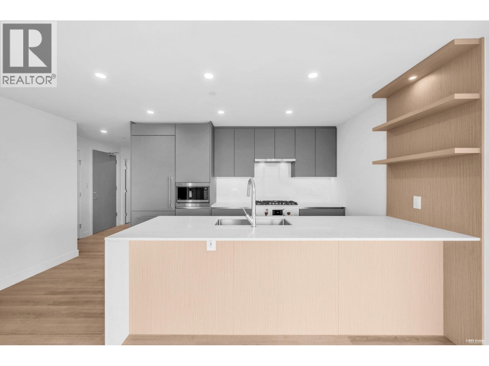 609 5520 Mcnaughton Road Property Photo 1
