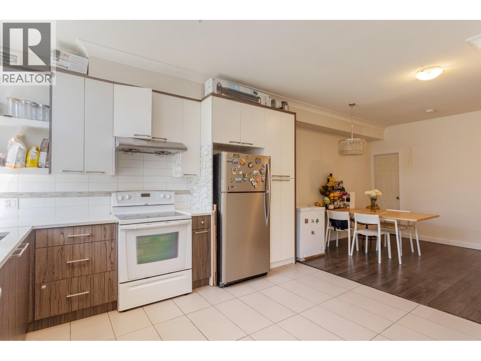 107 7533 GILLEY AVENUE Property Photo 1