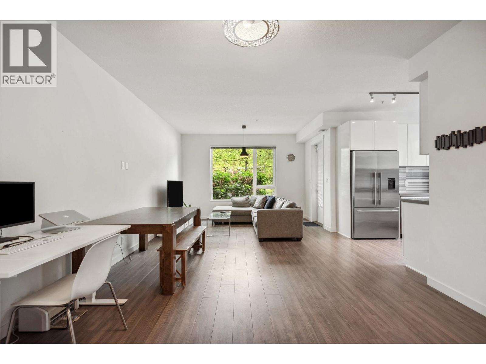 107 3138 RIVERWALK AVENUE Property Photo 1