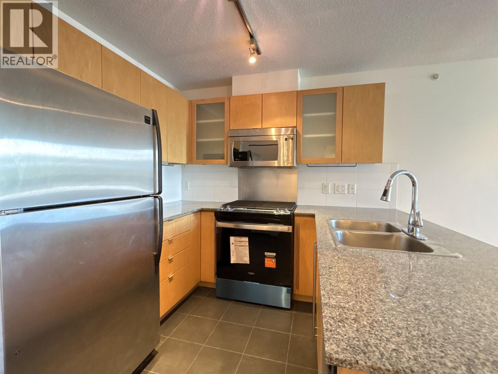 602 7575 Alderbridge Way Property Photo 3