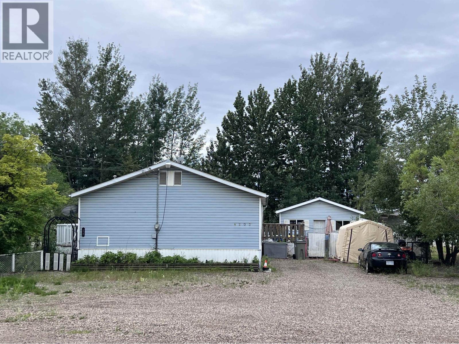 4203 E 52 Avenue Property Photo 1