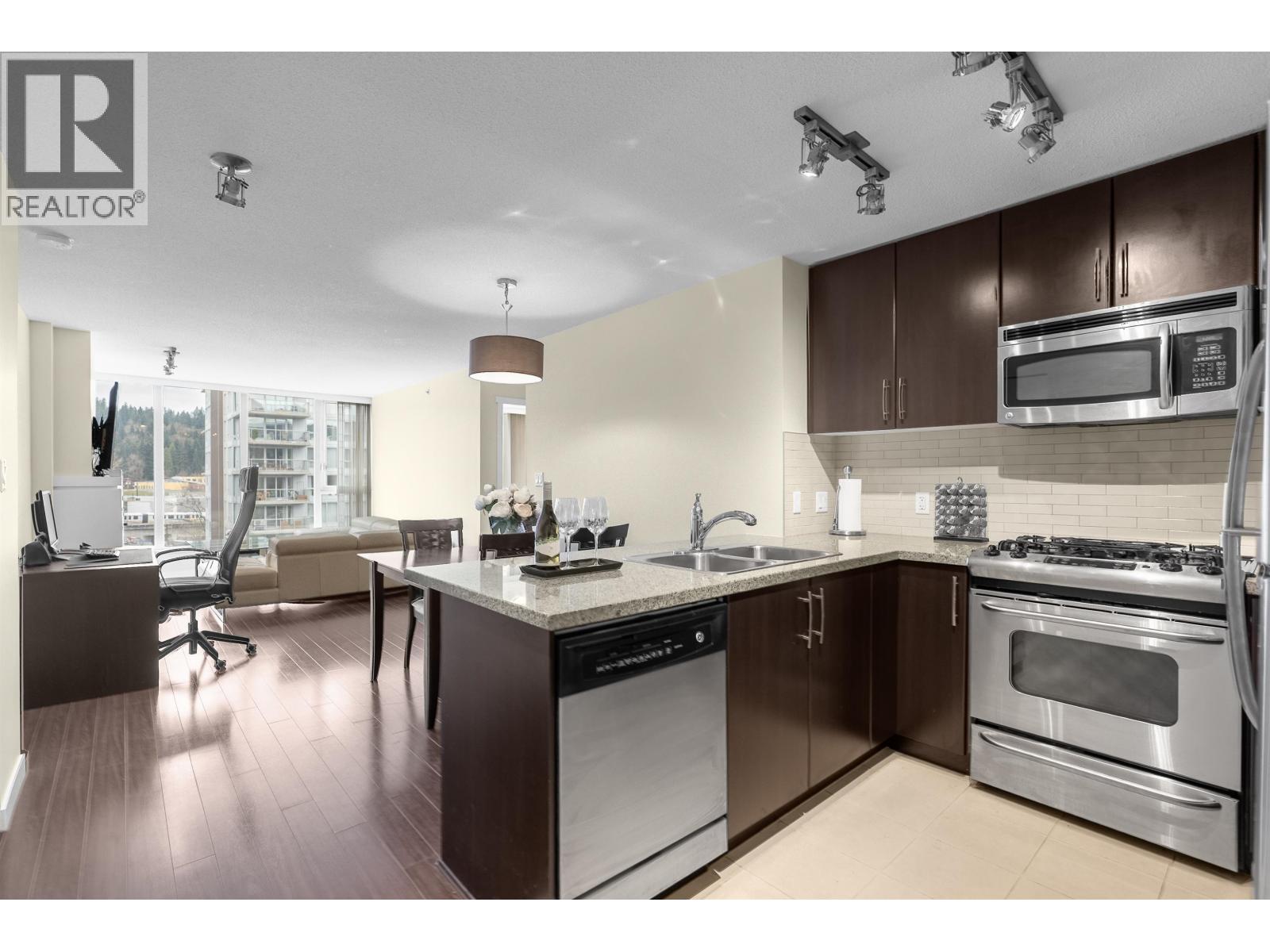 1202 660 NOOTKA WAY Property Photo 1
