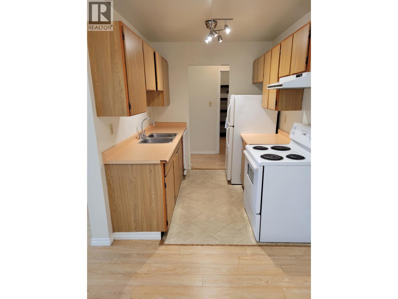 218 8500 LANSDOWNE ROAD Property Photo 1