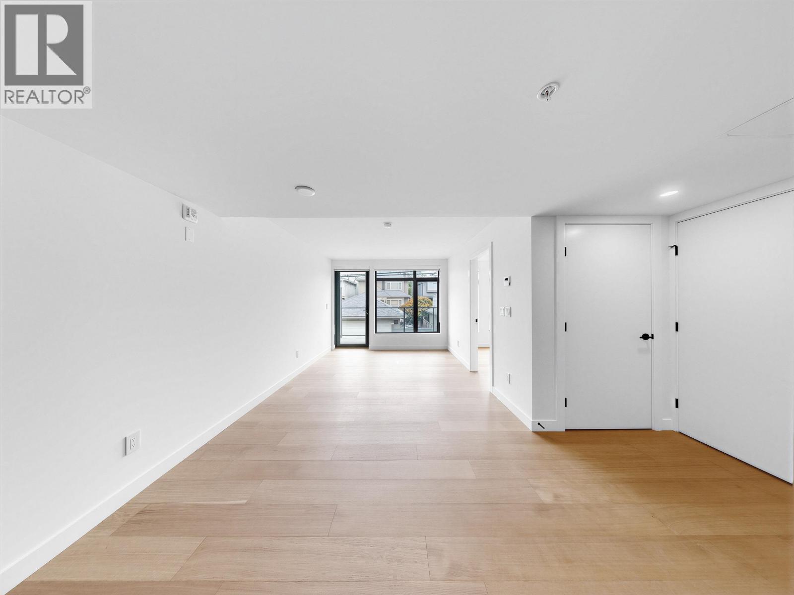 202 6485 Manitoba Street Property Photo 2