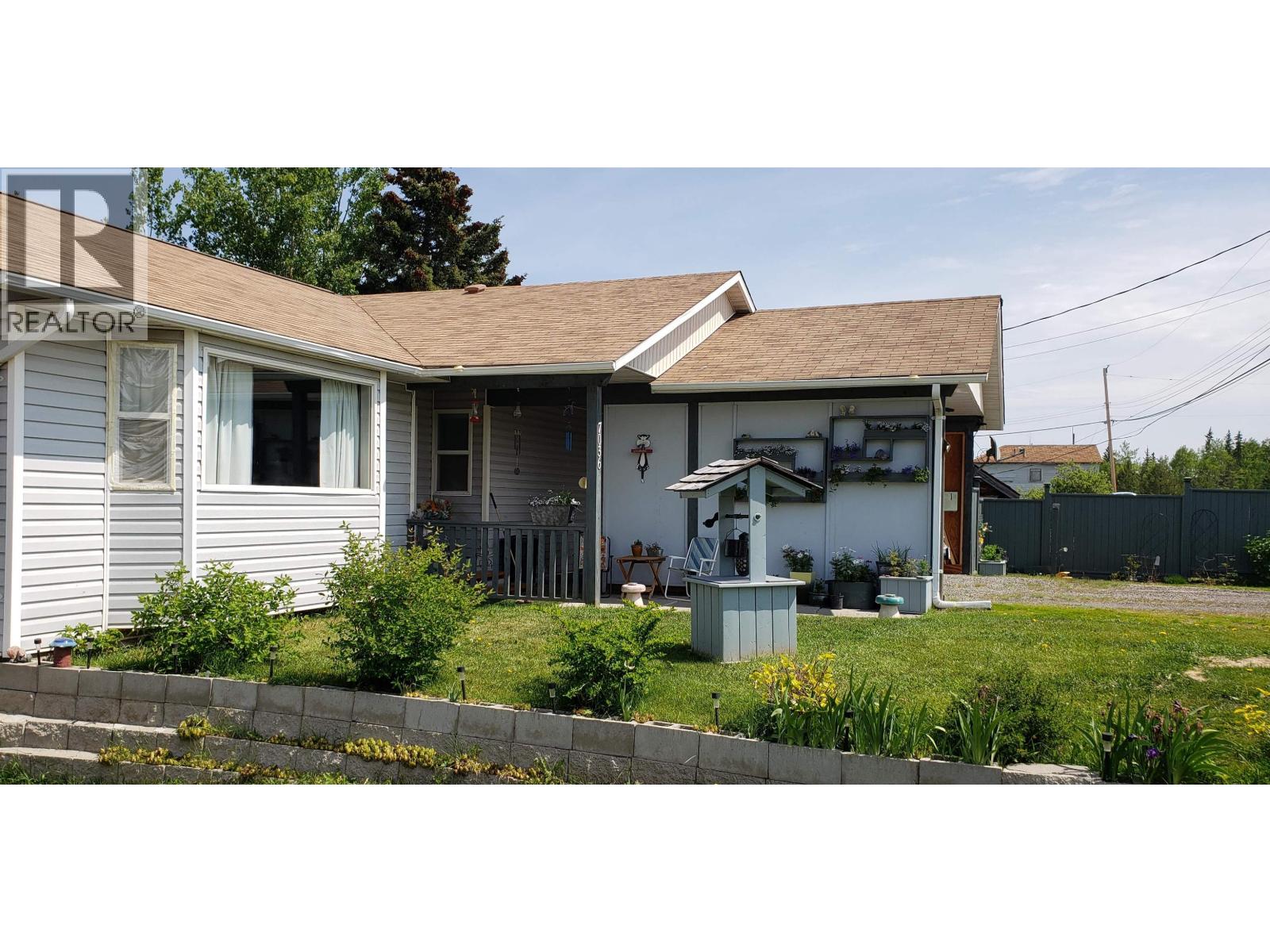 7036 93 Mile Frontage Road Property Photo 1