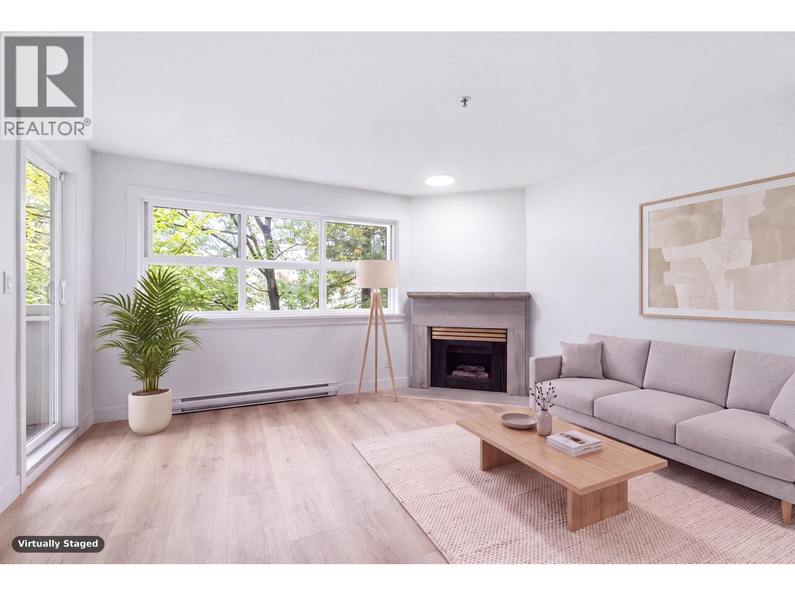 305 2928 Commercial Drive Property Photo 2