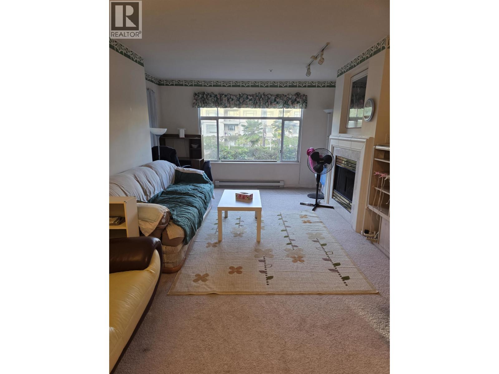 203 8180 Jones Road Property Photo 1