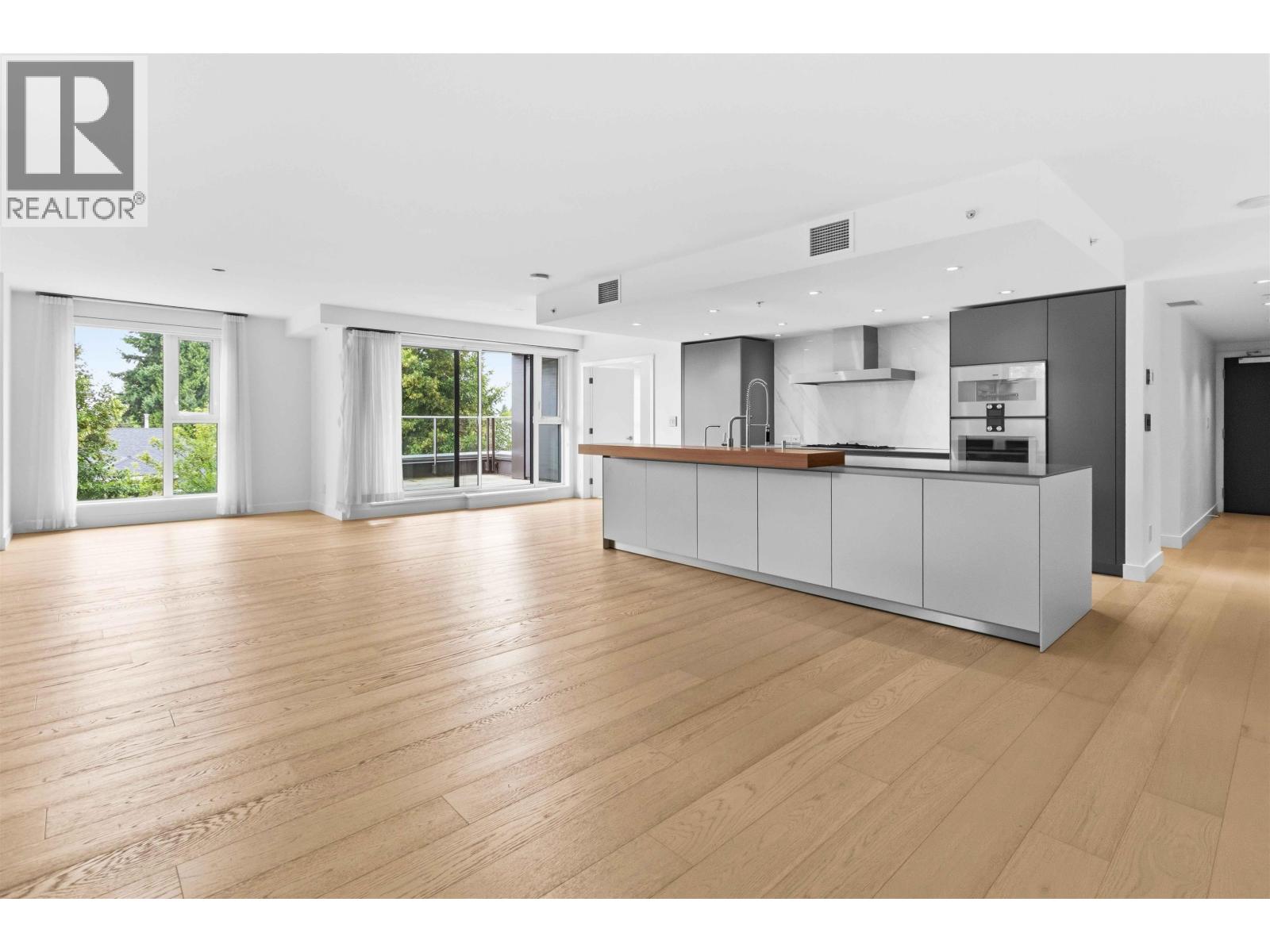 303 7128 ADERA STREET Property Photo 1