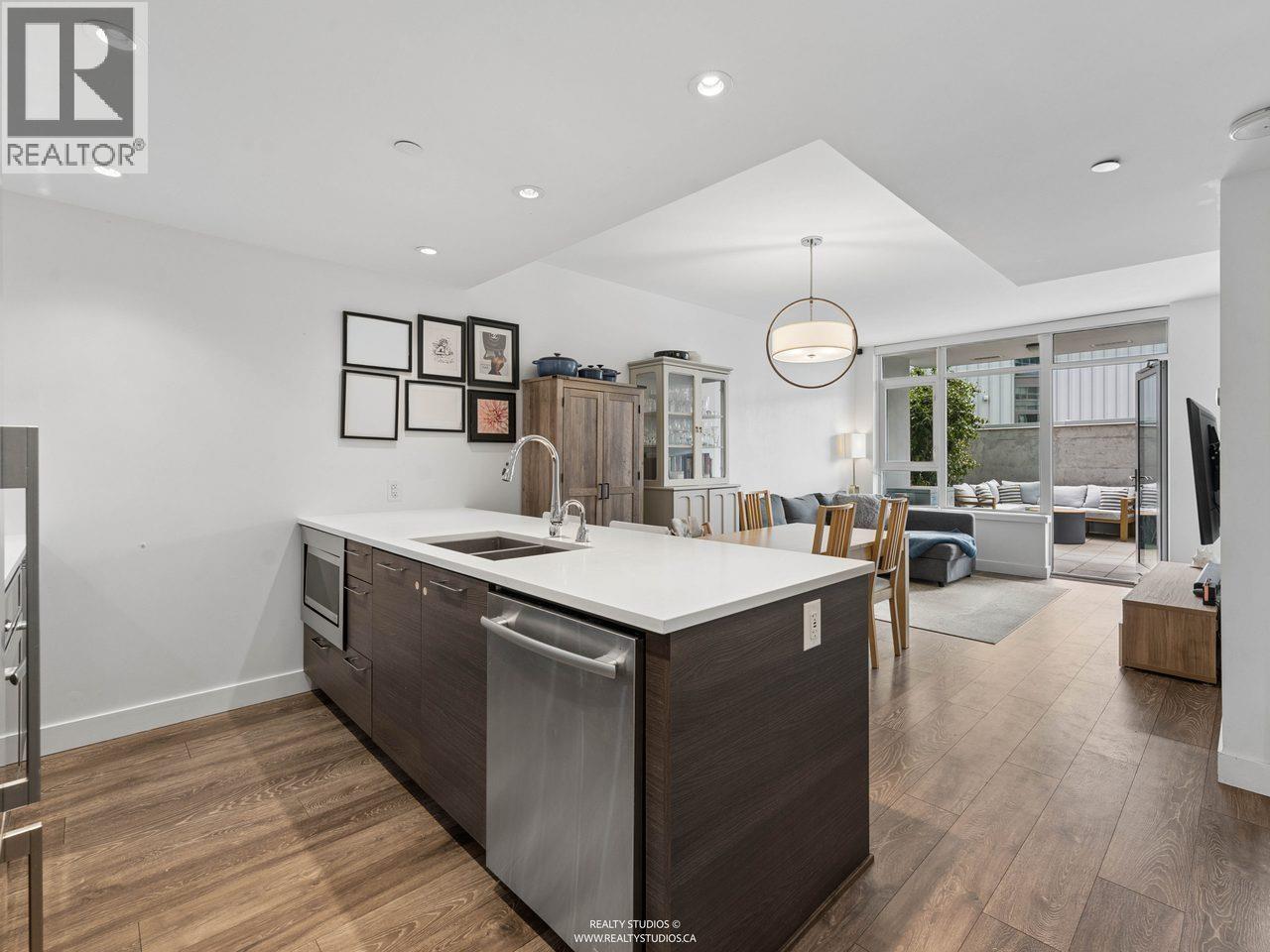 205 8538 River District Crossing Property Photo 2