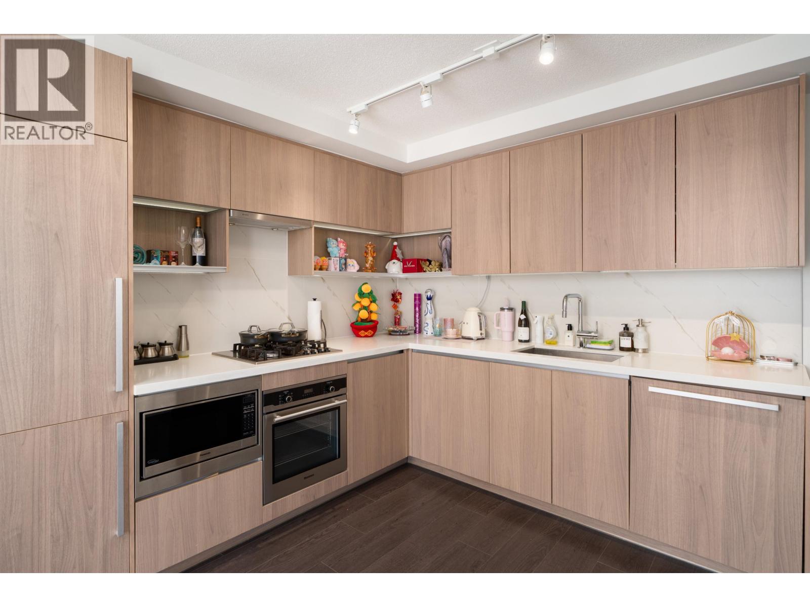 1602 8833 Hazelbridge Way Property Photo 2