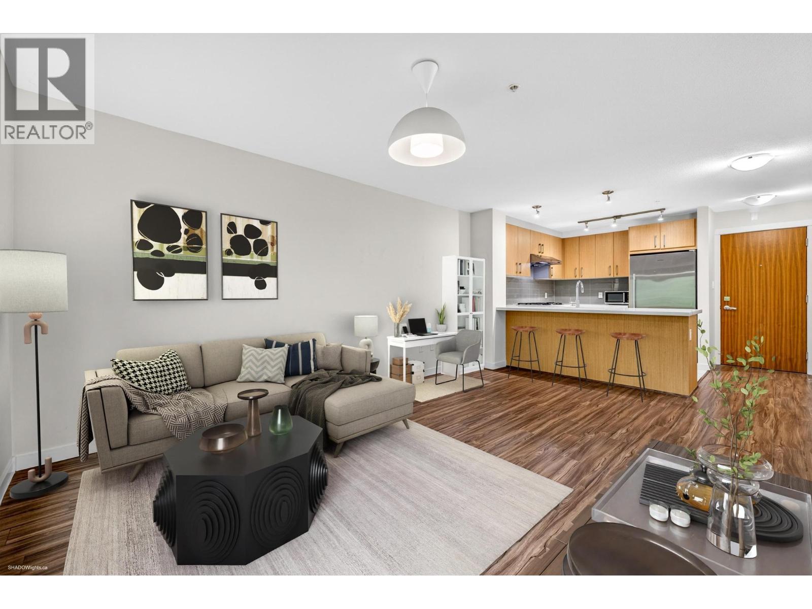 220 3163 RIVERWALK AVENUE Property Photo 1