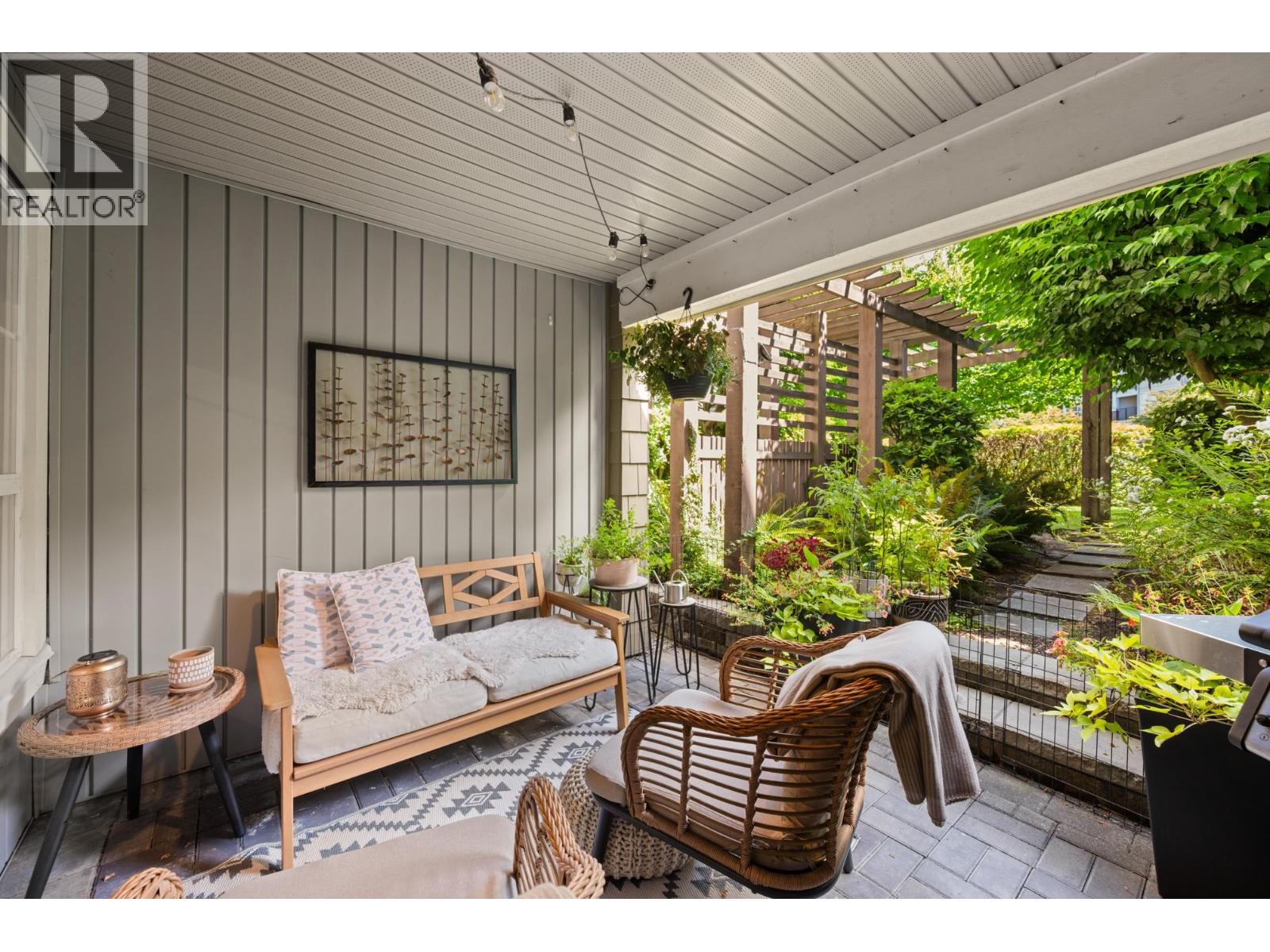 104 19673 MEADOW GARDENS WAY Property Photo 1