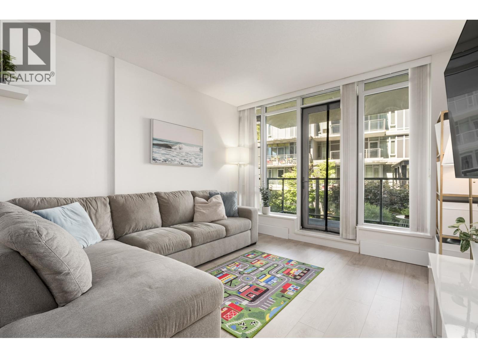 210 3168 Riverwalk Avenue Property Photo 2