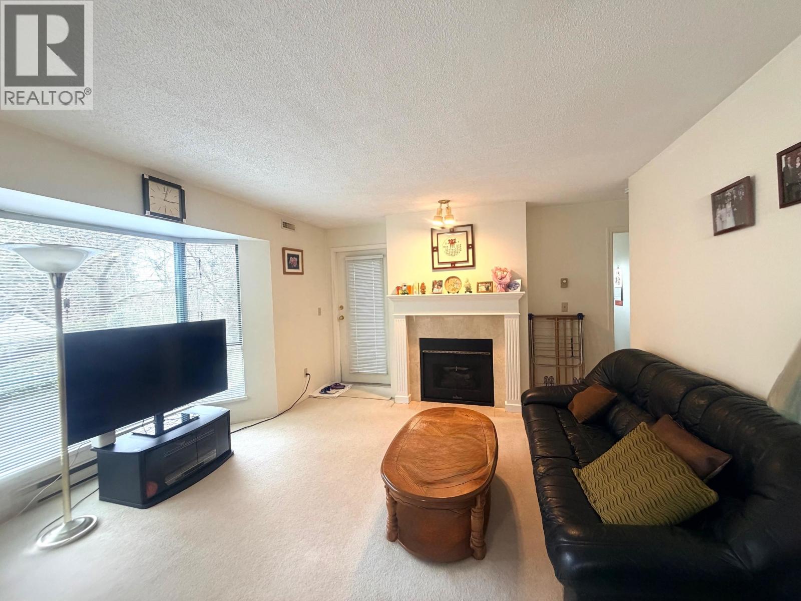 203 5250 VICTORY STREET Property Photo 1