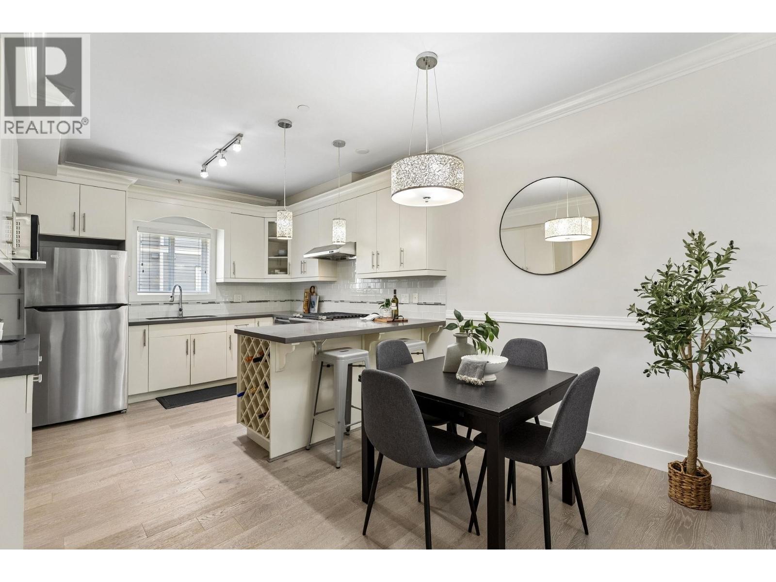 203 3488 Sefton Street Property Photo 6