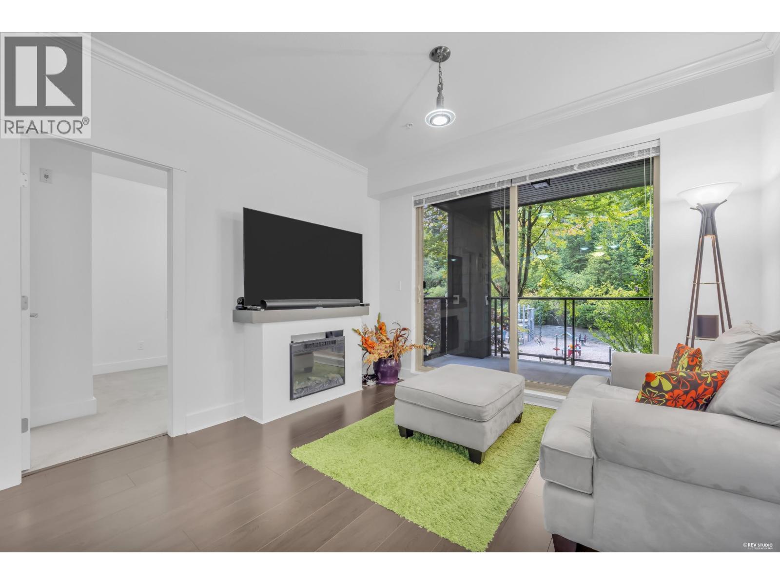 203 7418 BYRNEPARK WALK Property Photo 1