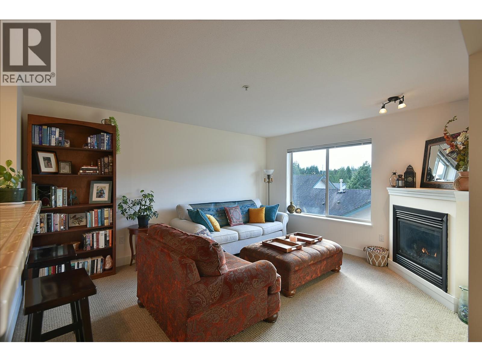 303 5711 Ebbtide Street Property Photo 2