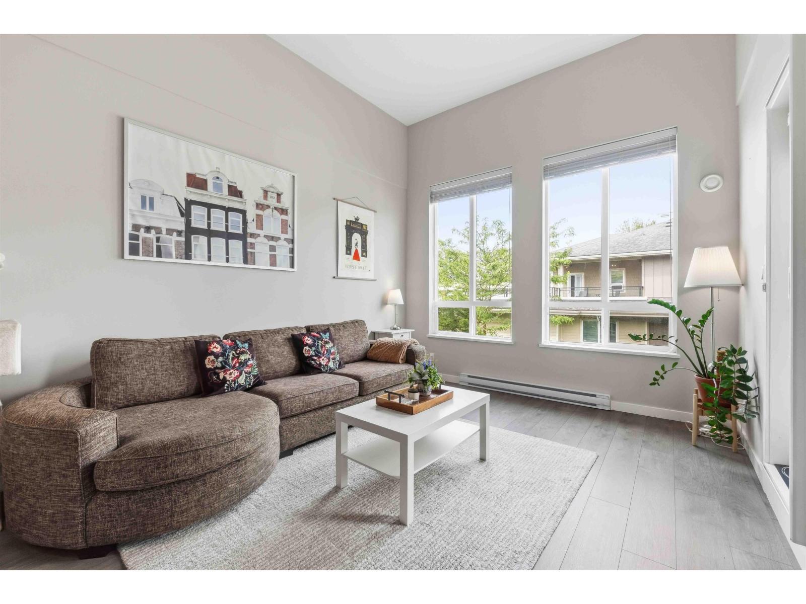 E405 20211 66 AVENUE Property Photo 1