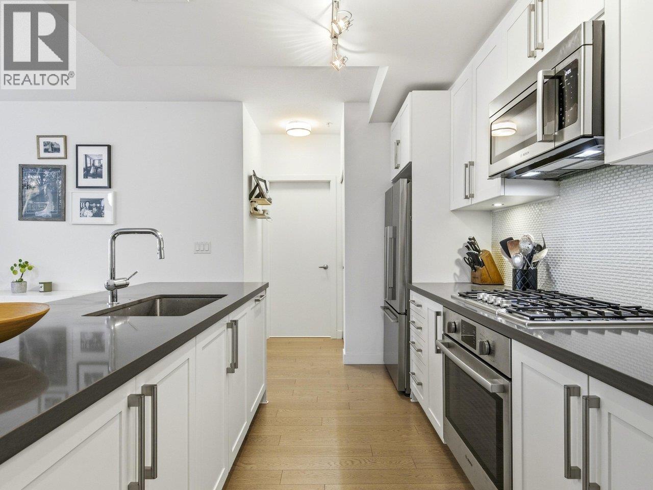 210 10177 River Drive Property Photo 3