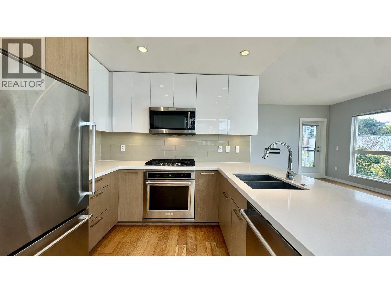 208 5311 CEDARBRIDGE WAY Property Photo 1