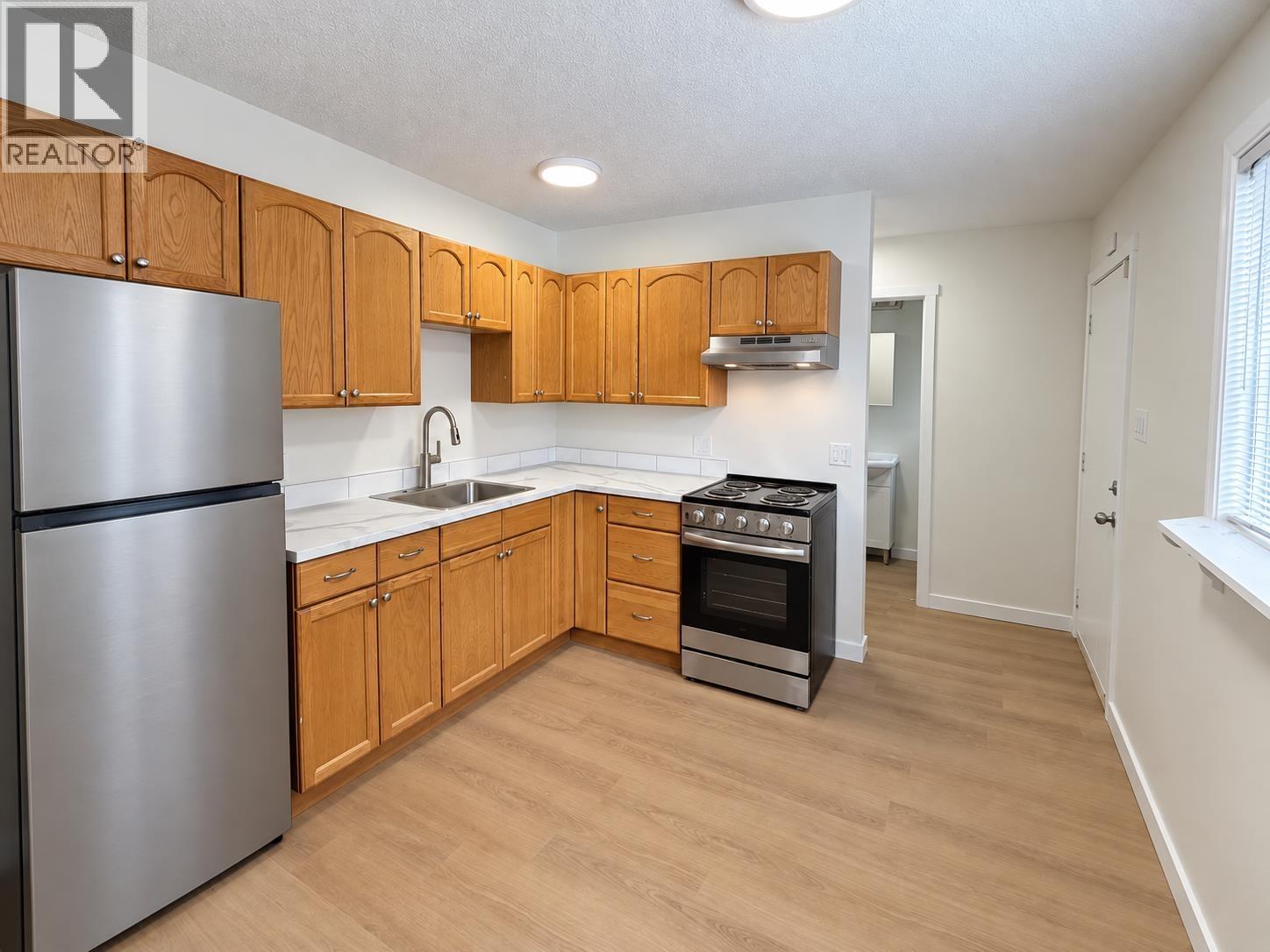 H107 1900 Strathcona Avenue Property Photo 1