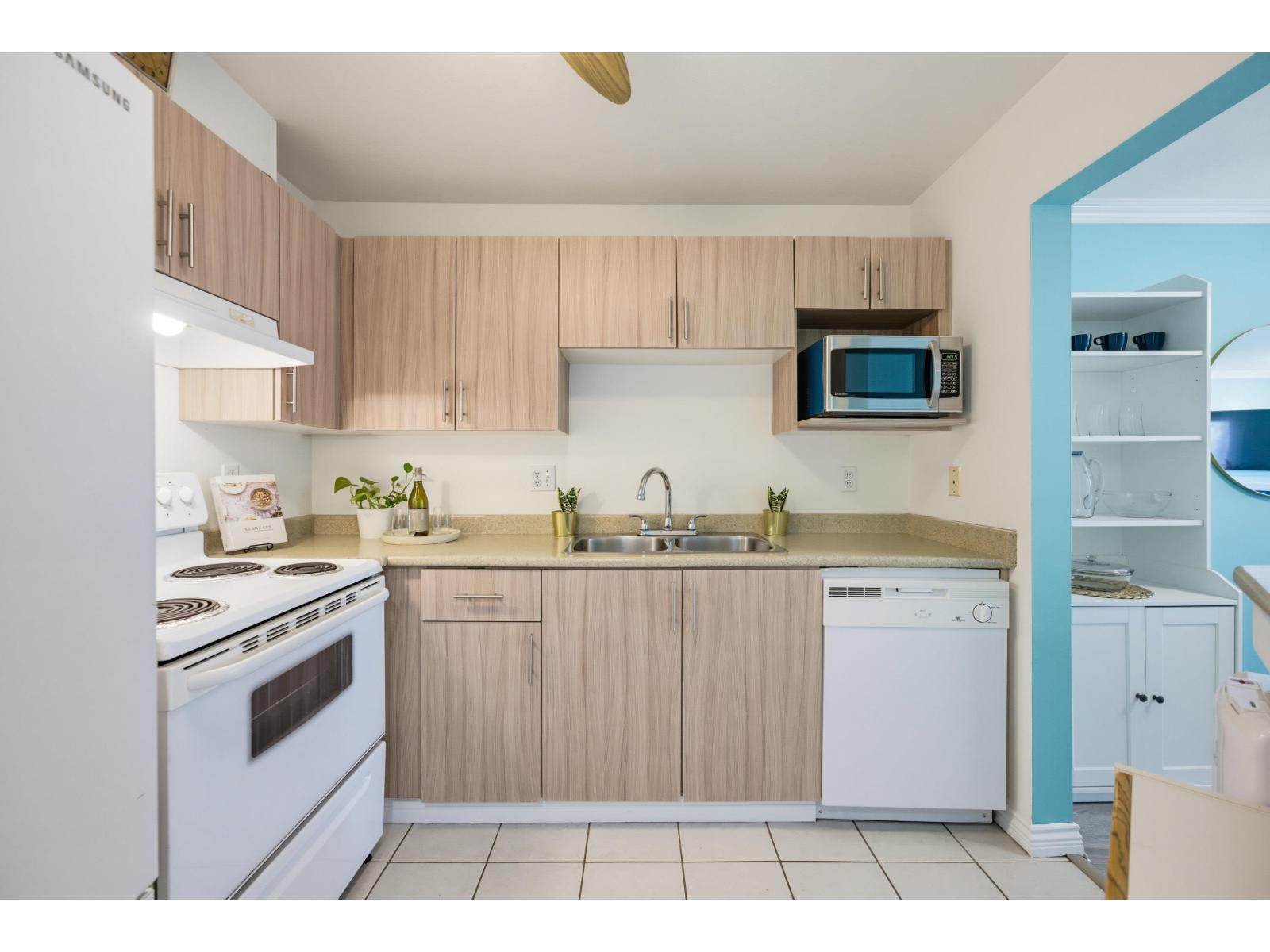 302 5759 Glover Road Property Photo 15