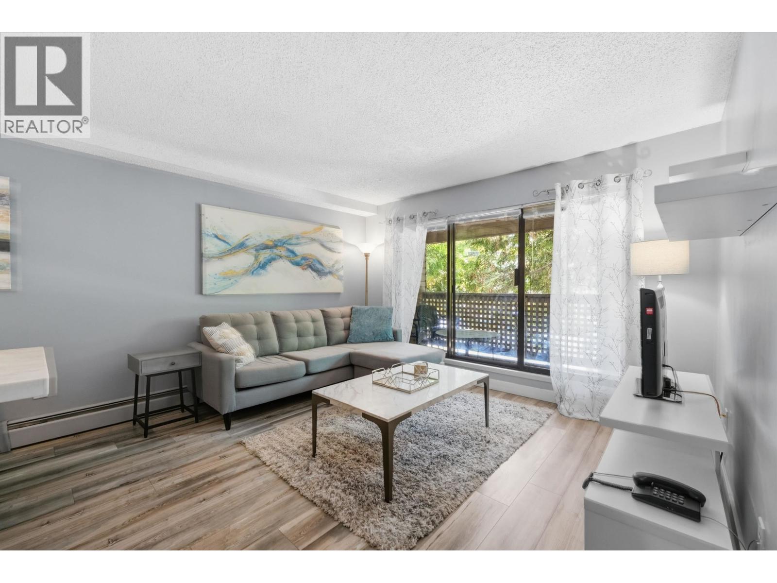 106 423 Agnes Street Property Photo 1