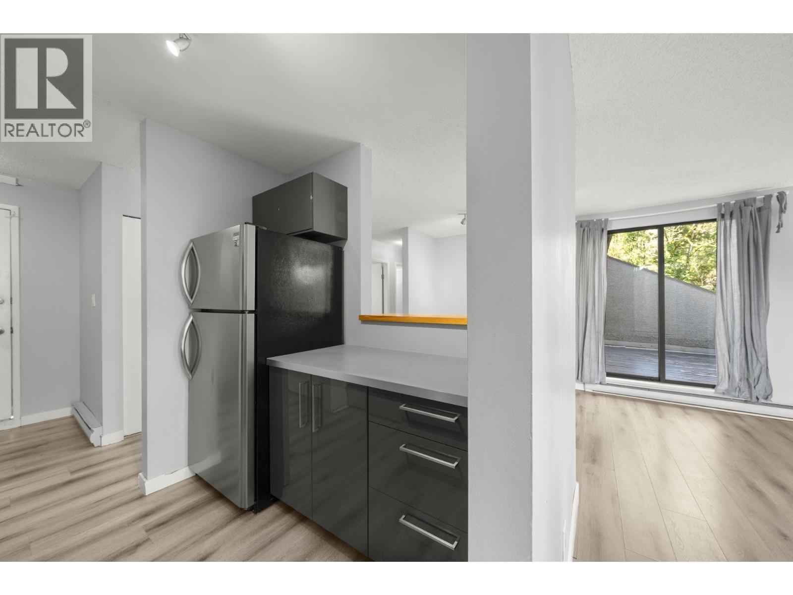 304 9128 Capella Drive Property Photo 1