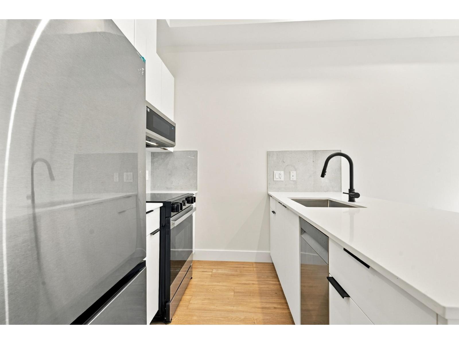106 14398 60 Avenue Property Photo 1