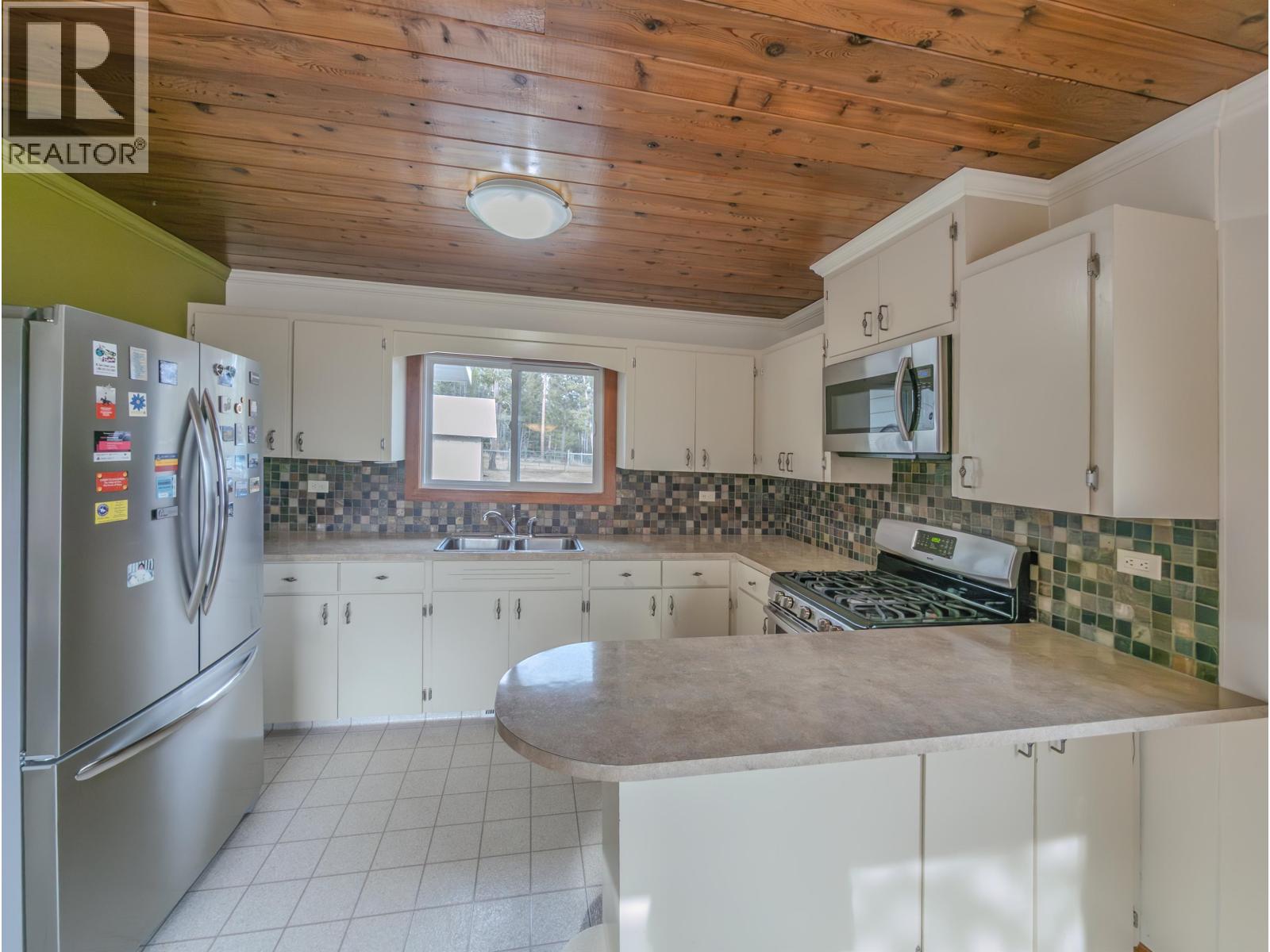 4734 Kitwanga Drive Property Photo 4