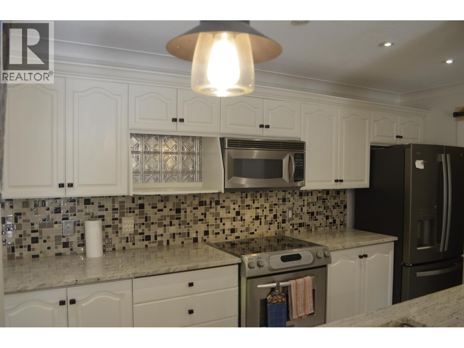 110 3176 Plateau Boulevard Property Photo 2