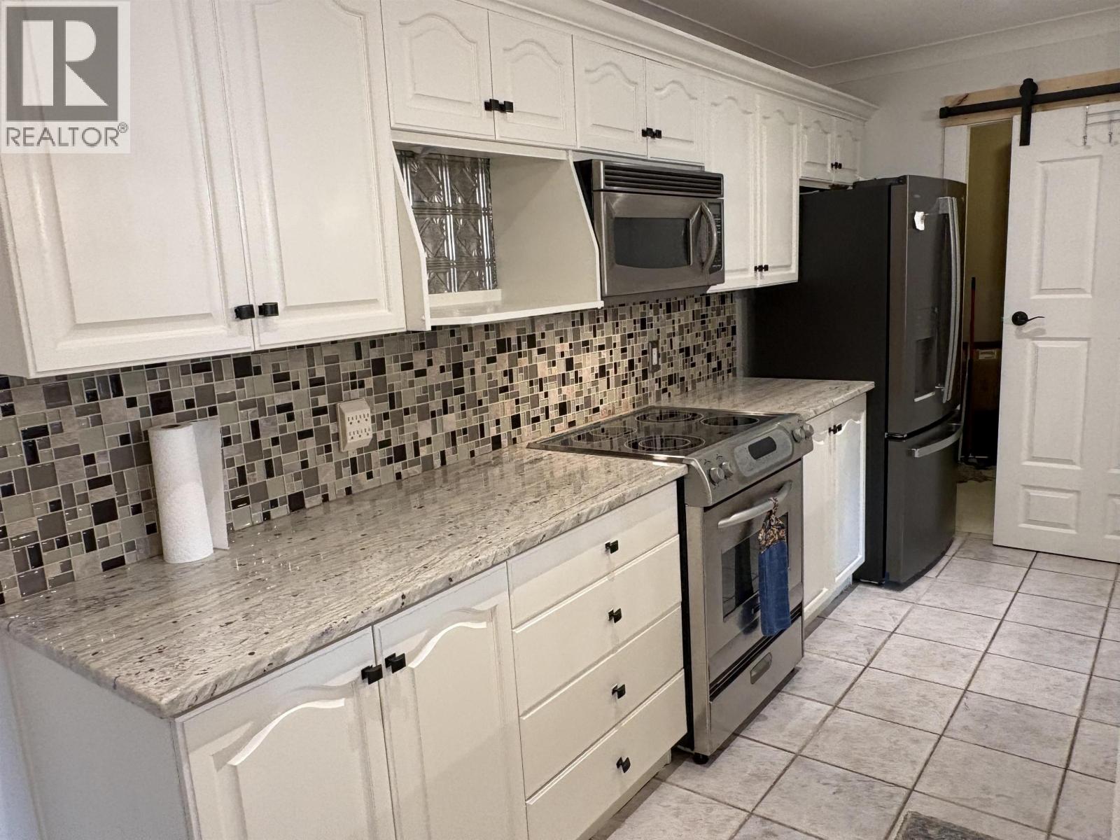 110 3176 Plateau Boulevard Property Photo 3