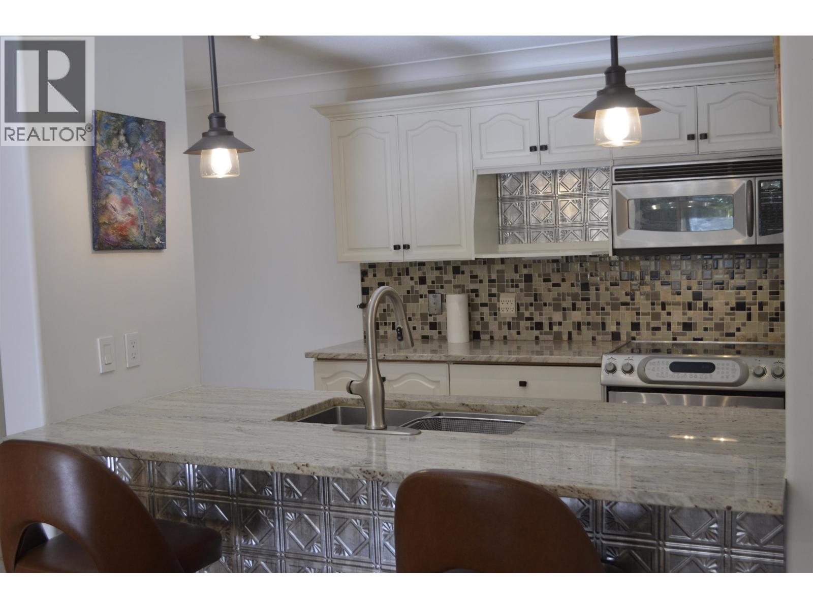 110 3176 Plateau Boulevard Property Photo 8