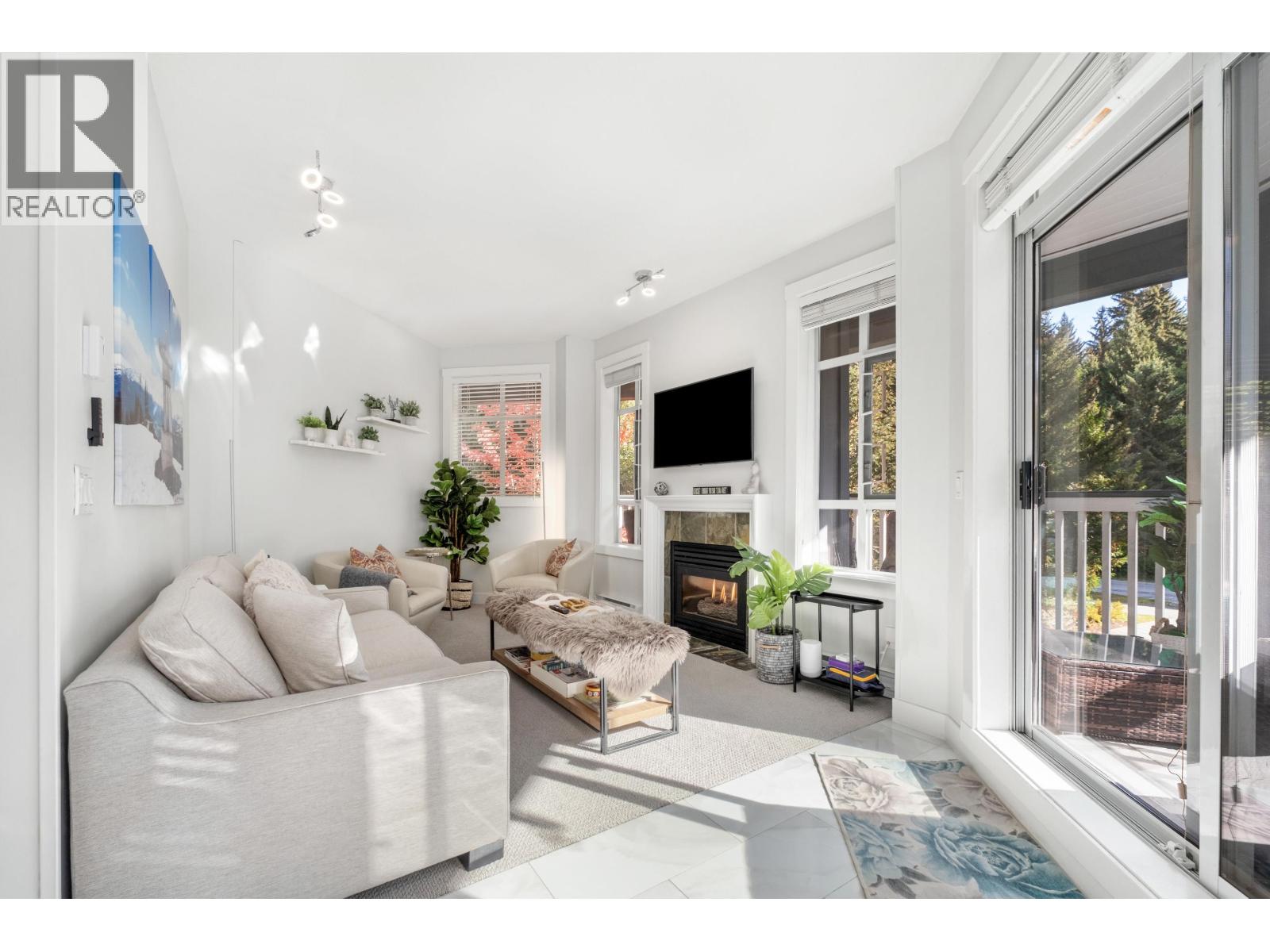 311 4405 BLACKCOMB WAY Property Photo 1